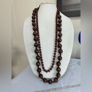 Two long vintage brown tone necklaces